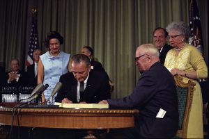 LBJ Signs Medicare bill 1965