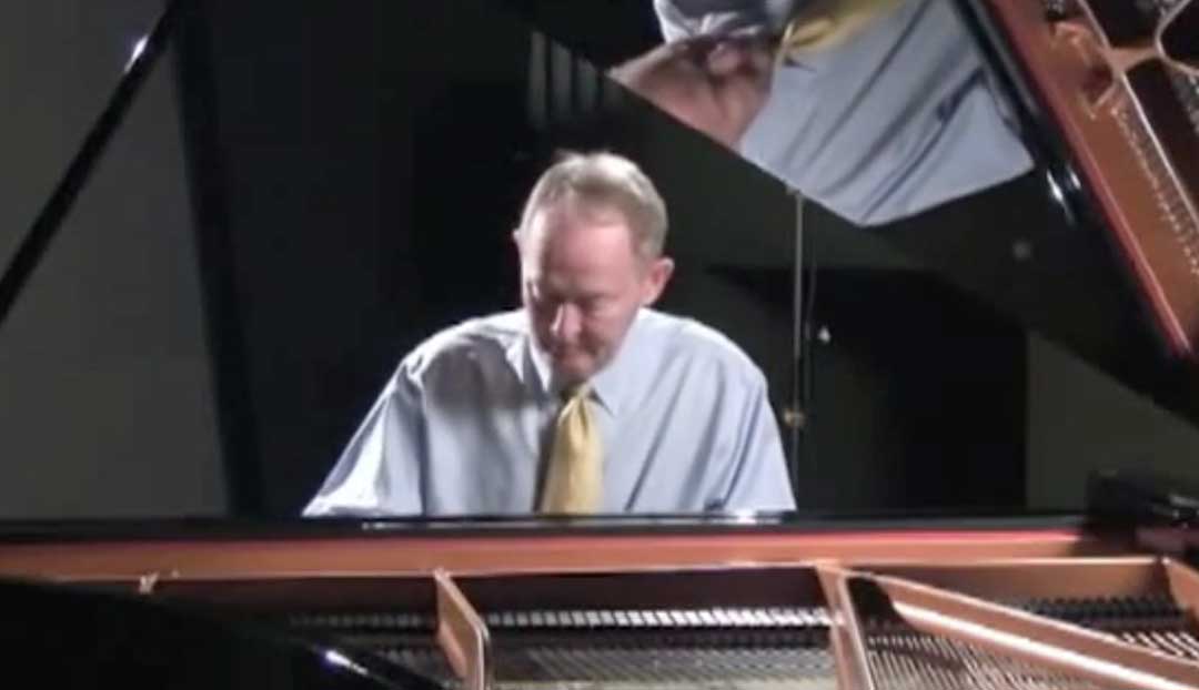 Senator Alexander, playing piano.