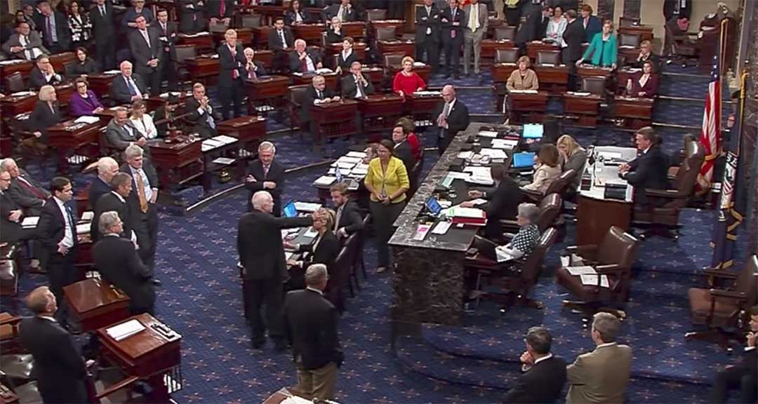 John McCain's thumb down vote.